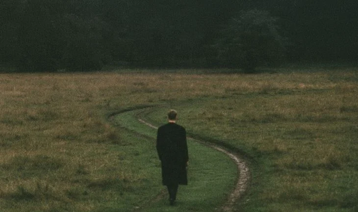 a banker on a country road going nowhere
