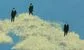 Three bankers in a cloud 