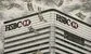 hsbc tower with dollars falling on it